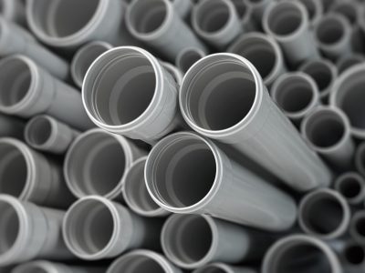 pvc-plastic-pipes-and-tubes-background-2021-09-02-23-13-49-utc-min-scaled